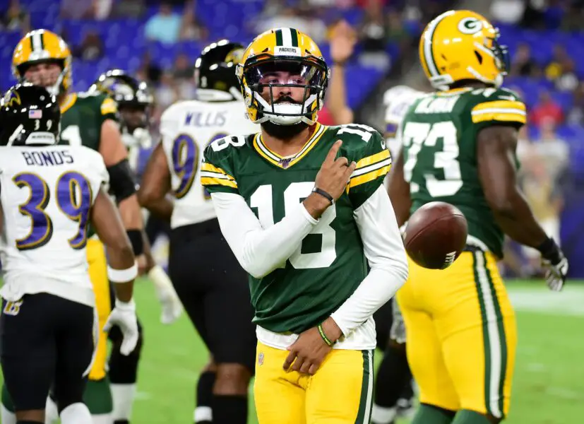 Aug 15, 2019; Baltimore, MD, USA; Green Bay Packers quarterback Manny Wilkins (18) reacts after being sacked in the fourth quarter against the Baltimore Ravens at M&T Bank Stadium. Mandatory Credit: Evan Habeeb-USA TODAY Sports