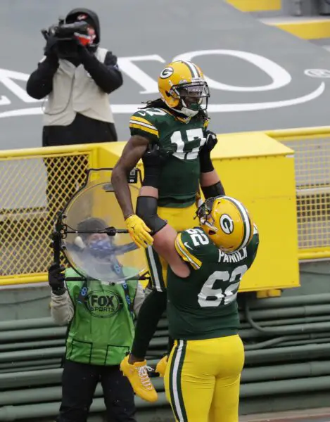 Nov 1, 2020; Green Bay, Wisconsin, USA; Green Bay Packers wide receiver Davante Adams (17) celebrates with offensive guard Lucas Patrick (62) after a first quarter touchdown reception by Adams against the Minnesota Vikings at Lambeau Field. Dan Powers/Appleton Post-Crescent via USA TODAY NETWORK