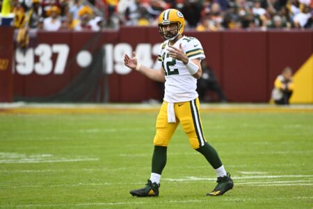 Oct 23, 2022; Landover, Maryland, USA; Green Bay Packers quarterback Aaron Rodgers (12) reacts against the Washington Commanders during the second half at FedExField. Mandatory Credit: Brad Mills-USA TODAY Sports
