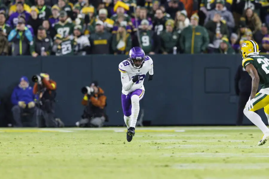 Jan 1, 2023; Green Bay, Wisconsin, USA; Minnesota Vikings wide receiver Justin Jefferson (18) during the game against the Green Bay Packers at Lambeau Field. Mandatory Credit: Jeff Hanisch-USA TODAY Sports