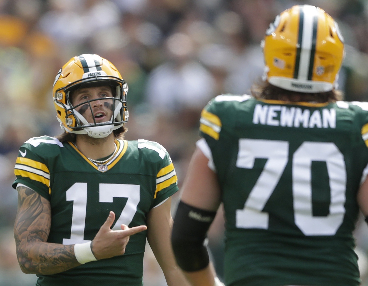 Aug 26, 2023; Green Bay, WI, USA; Green Bay Packers quarterback Alex McGough (17) talks with guard Royce Newman (70) following a false start penalty against the Seattle Seahawks during their preseason football game at Lambeau Field. Green Bay defeated Seattle 19-15. Mandatory Credit: Wm. Glasheen-USA TODAY Sports