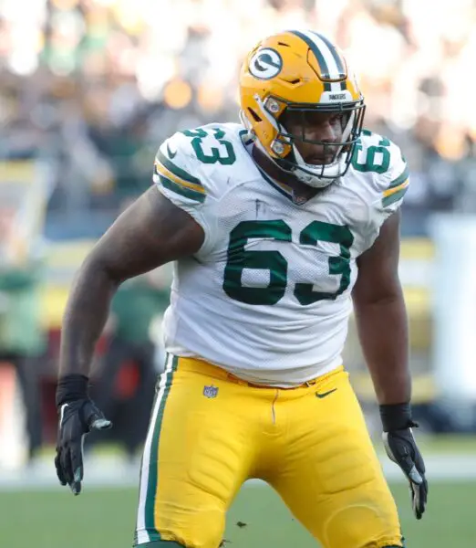 Nov 12, 2023; Pittsburgh, Pennsylvania, USA; Green Bay Packers offensive tackle Rasheed Walker (63) blocks at the line of scrimmage against Pittsburgh Steelers linebacker Alex Highsmith (56) during the third quarter at Acrisure Stadium. Mandatory Credit: Charles LeClaire-USA TODAY Sports