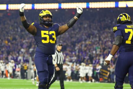 Jan 8, 2024; Houston, TX, USA; Michigan Wolverines offensive lineman Trente Jones (53) celebrates after a touchdown against the Washington Huskies during the first quarter in the 2024 College Football Playoff national championship game at NRG Stadium. Mandatory Credit: Mark J. Rebilas-USA TODAY Sports (Green Bay Packers)