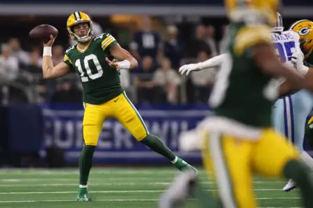 Jan 14, 2024; Arlington, Texas, USA; Green Bay Packers quarterback Jordan Love (10) drops back to pass against the Dallas Cowboys in the first quarter for the 2024 NFC wild card game at AT&T Stadium. Mandatory Credit: Tim Heitman-USA TODAY Sports