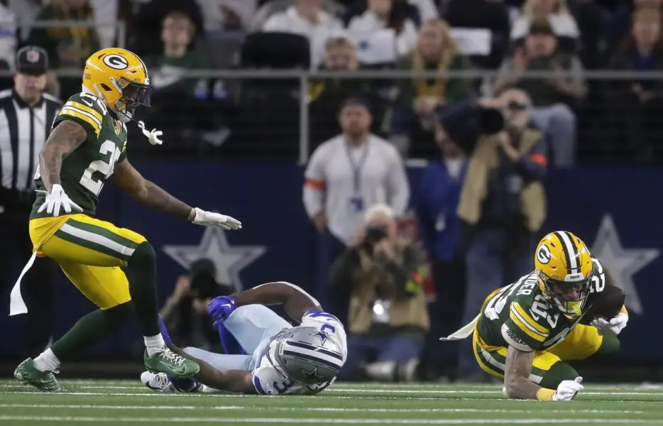 Jan 14, 2024; Arlington, Texas, USA; Green Bay Packers cornerback Jaire Alexander (23) intercepts a pass during the second quarter of their wild card playoff game Sunday, January 14, 2024 at AT&T Stadium in Arlington, Texas. Mandatory Credit: Wm. Glasheen-USA TODAY Sports