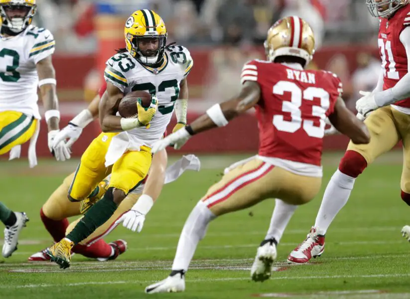 Green Bay Packers running back Aaron Jones (33) runs for a gain againsts the San Francisco 49ers during their NFC divisional playoff football game Saturday, January 20, 2024, at Levi's Stadium in Santa Clara, California. © Dan Powers/USA TODAY NETWORK-Wisconsin / USA TODAY NETWORK