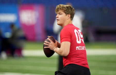 Mar 2, 2024; Indianapolis, IN, USA; Michigan quarterback J J McCarthy (QB05) during the 2024 NFL Combine at Lucas Oil Stadium. Mandatory Credit: Kirby Lee-USA TODAY Sports