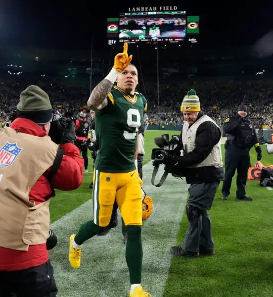 Green Bay Packers wide receiver Christian Watson (9) acknowledges fans after their 31-28 overtime win against the Dallas Cowboys on Sunday, Nov. 13, 2022 at Lambeau Field in Green Bay. © Mike De Sisti / Milwaukee Journal Sentinel / USA TODAY NETWORK