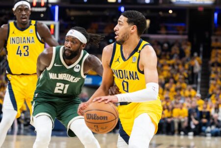 Apr 26, 2024; Indianapolis, Indiana, USA; Indiana Pacers guard Tyrese Haliburton (0) dribbles the ball while Milwaukee Bucks guard Patrick Beverley (21) defends during game three of the first round for the 2024 NBA playoffs at Gainbridge Fieldhouse. Mandatory Credit: Trevor Ruszkowski-USA TODAY Sports