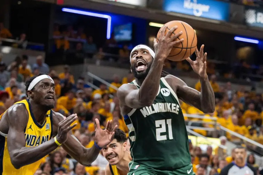 May 2, 2024; Indianapolis, Indiana, USA; Milwaukee Bucks guard Patrick Beverley (21) shoots the ball while Indiana Pacers forward Pascal Siakam (43) defends during game six of the first round for the 2024 NBA playoffs at Gainbridge Fieldhouse. Mandatory Credit: Trevor Ruszkowski-USA TODAY Sports
