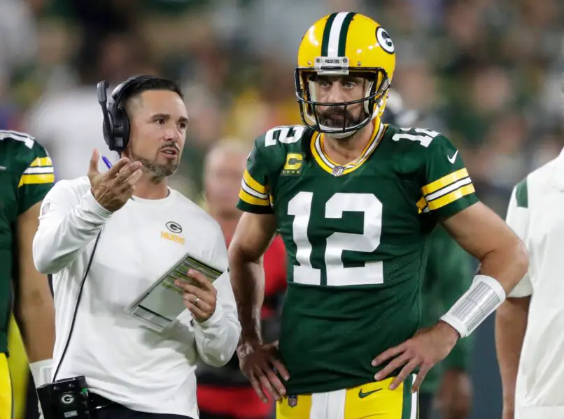 Green Bay Packers head coach Matt LaFleur talks with quarterback Aaron Rodgers (12) in between quarters against the Chicago Bears during their football game Sunday, September 18, 2022, at Lambeau Field in Green Bay, Wis. Dan Powers/USA TODAY NETWORK-Wisconsin