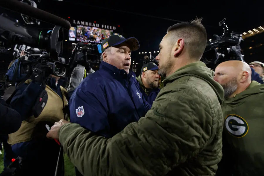 Nov 13, 2022; Green Bay, Wisconsin, USA; Dallas Cowboys head coach Mike McCarthy talks with Green Bay Packers head coach Matt LaFleur following the game at Lambeau Field. Mandatory Credit: Jeff Hanisch-USA TODAY Sports