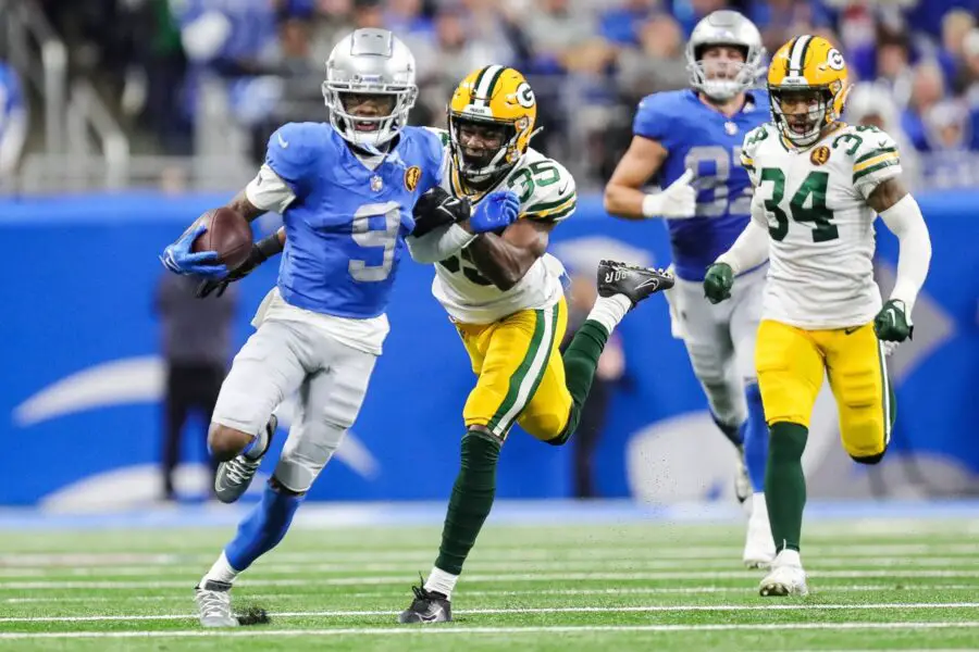 Detroit Lions wide receiver Jameson Williams (9) runs against Green Bay Packers cornerback Corey Ballentine (35) during the second half at Ford Field in Detroit on Thursday, Nov. 23, 2023. © Junfu Han / USA TODAY NETWORK