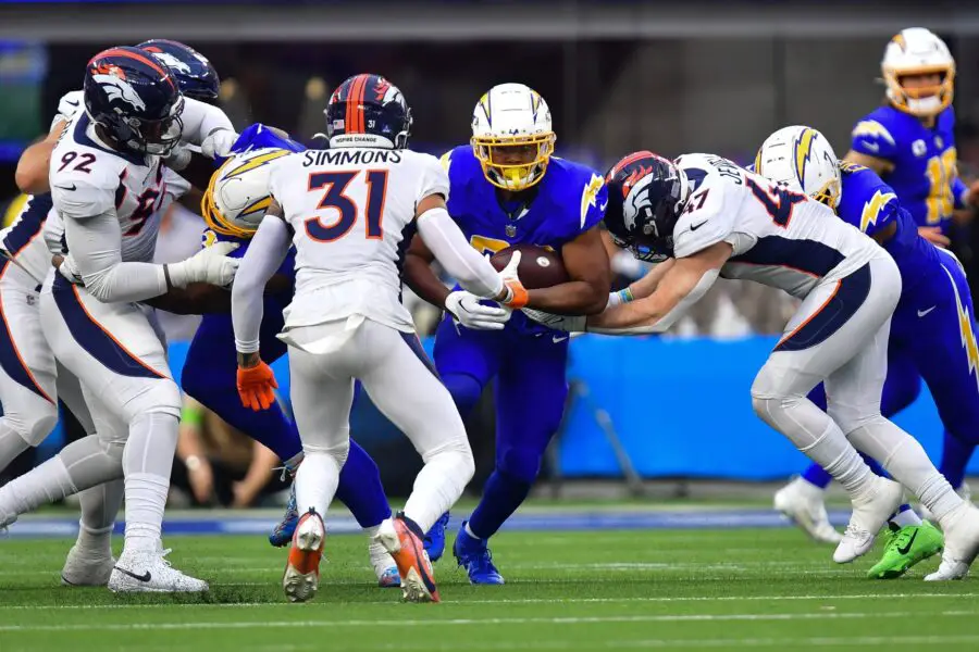Green Bay Packers: The Defense Just Had A Major Story Break That Could Be Huge 2 Dec 10, 2023; Inglewood, California, USA; Los Angeles Chargers running back Joshua Kelley (25) runs the ball against Denver Broncos linebacker Josey Jewell (47) and safety Justin Simmons (31) during the first half at SoFi Stadium. Mandatory Credit: Gary A. Vasquez-USA TODAY Sports (Green Bay Packers)