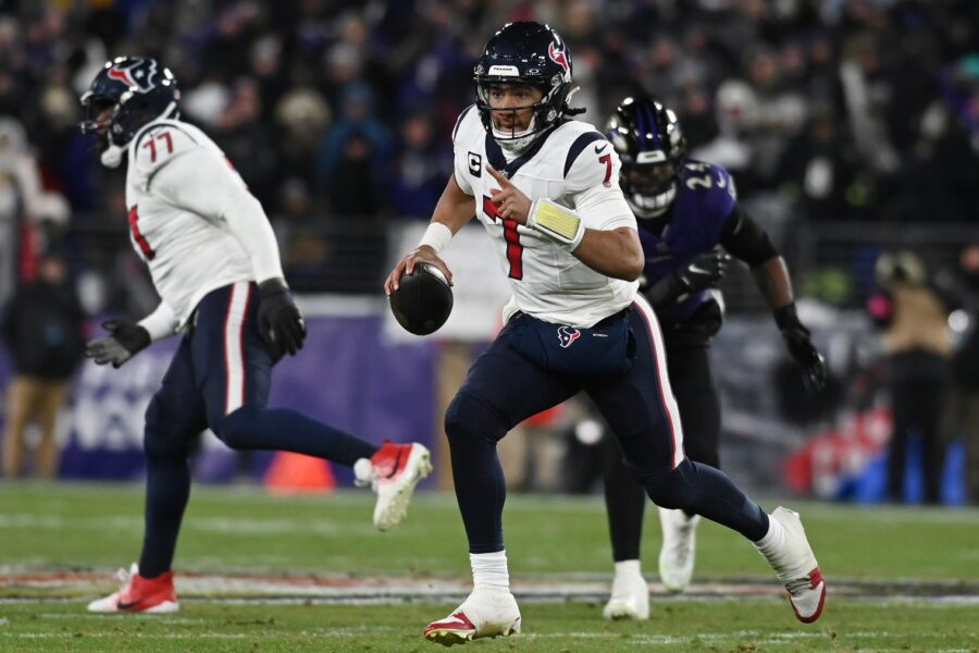 Jan 20, 2024; Baltimore, MD, USA; Houston Texans quarterback C.J. Stroud (7) runs the ball against the Baltimore Ravens during the second quarter of a 2024 AFC divisional round game at M&T Bank Stadium. Mandatory Credit: Tommy Gilligan-USA TODAY Sports (Green Bay Packers)