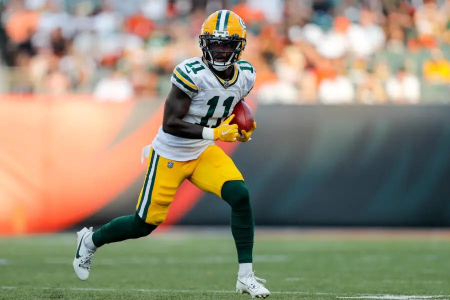 Aug 11, 2023; Cincinnati, Ohio, USA; Green Bay Packers wide receiver Jayden Reed (11) runs with the ball on a punt return in the first half against the Cincinnati Bengals at Paycor Stadium. Mandatory Credit: Katie Stratman-USA TODAY Sports