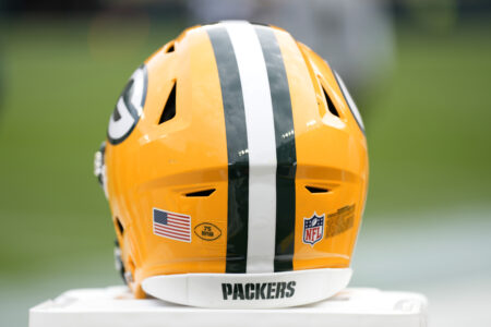 Sep 24, 2023; Green Bay, Wisconsin, USA; A Green Bay Packers helmet sits on the sidelines during the game against the New Orleans Saints at Lambeau Field. Mandatory Credit: Jeff Hanisch-USA TODAY Sports