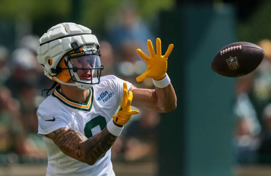 Green Bay Packers wide receiver Christian Watson (9) catches a pass during the first day of training camp on Monday, July 22, 2024, at Ray Nitschke Field in Green Bay, Wis. Tork Mason/USA TODAY NETWORK-Wisconsin