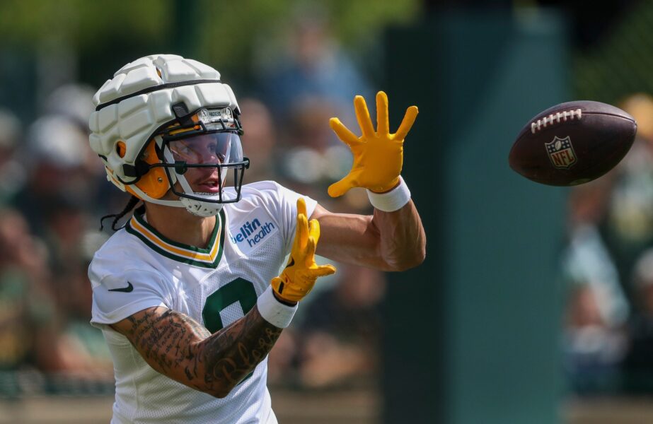 Green Bay Packers wide receiver Christian Watson (9) catches a pass during the first day of training camp on Monday, July 22, 2024, at Ray Nitschke Field in Green Bay, Wis.  Tork Mason/USA TODAY NETWORK-Wisconsin