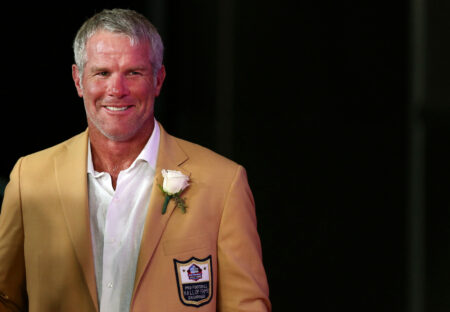 Aug 6, 2016; Canton, OH, USA; Former Green Bay quarterback Brett Favre looks on after giving his acceptance speech during the 2016 NFL Hall of Fame enshrinement at Tom Benson Hall of Fame Stadium. Mandatory Credit: Aaron Doster-USA TODAY Sports