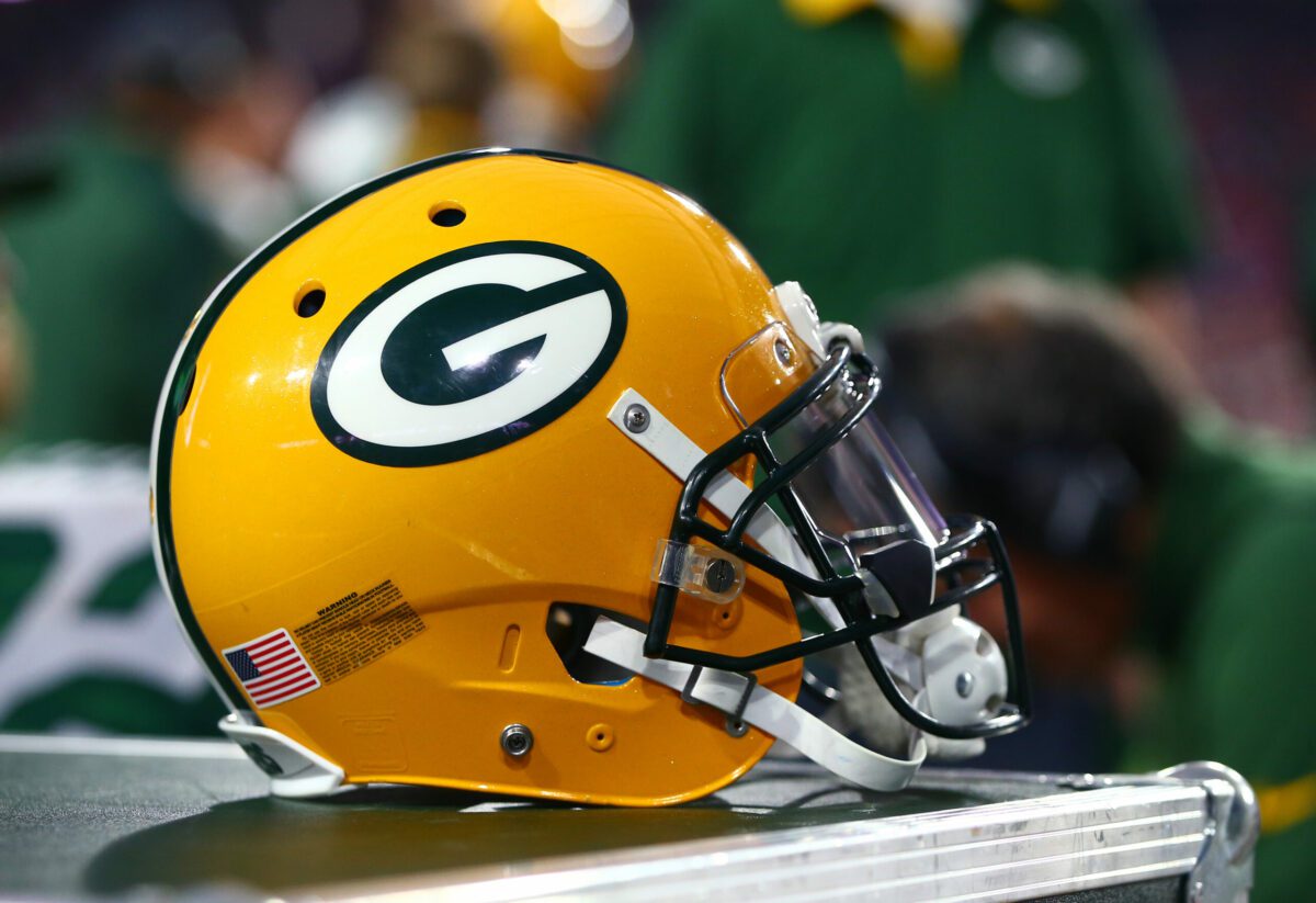Packers: Legendary College Basketball Coach Announces He's A Diehard Green Bay Fan 3 Dec 27, 2015; Glendale, AZ, USA; Detailed view of a Green Bay Packers helmet against the Arizona Cardinals at University of Phoenix Stadium. The Cardinals defeated the Packers 38-8. Mandatory Credit: Mark J. Rebilas-USA TODAY Sports