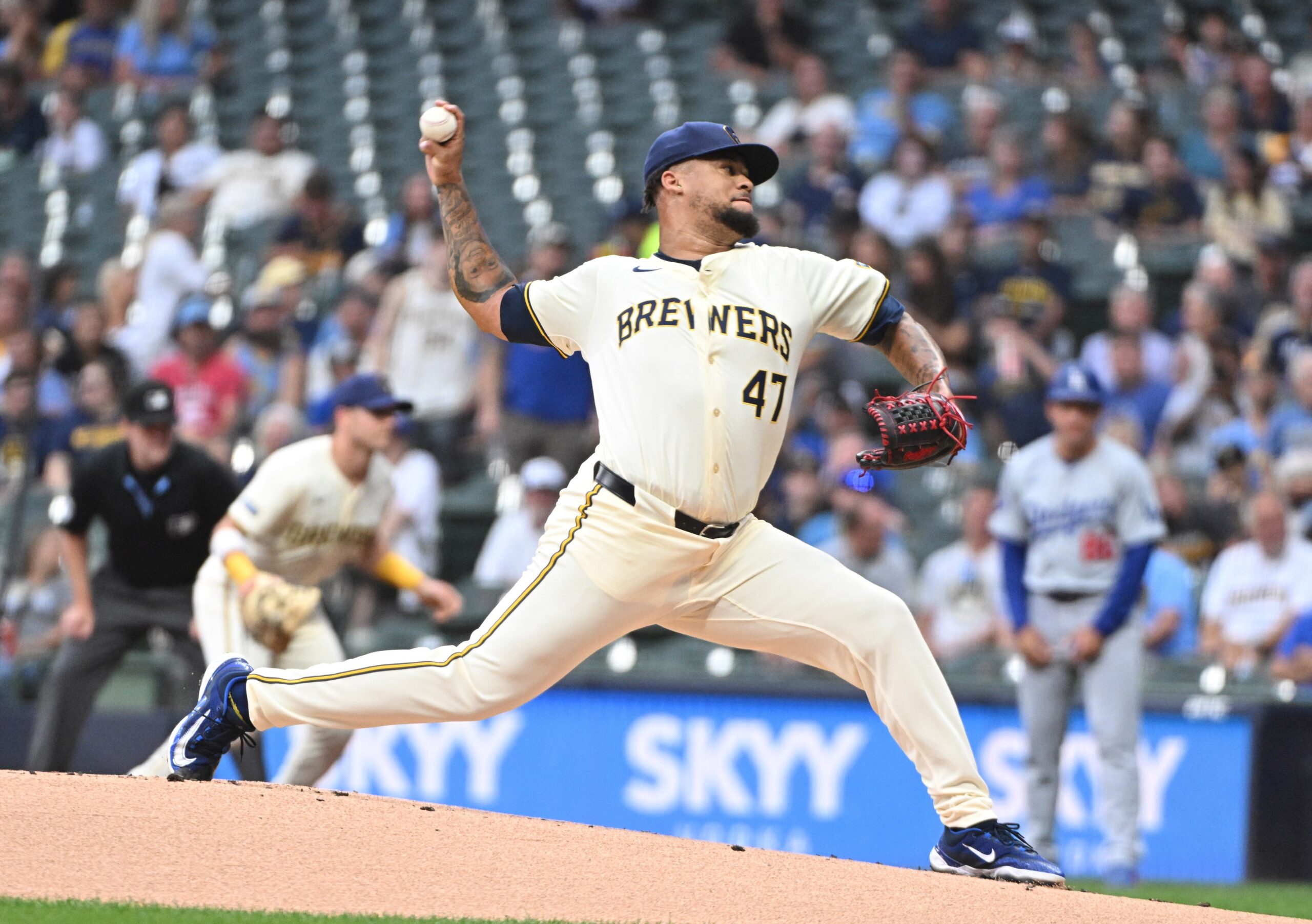 Aug 14, 2024; Milwaukee, Wisconsin, USA; Milwaukee Brewers pitcher Frankie Montas (47) delivers a pitch against the Los Angeles Dodgers in the first inning at American Family Field. Mandatory Credit: Michael McLoone-USA TODAY Sports