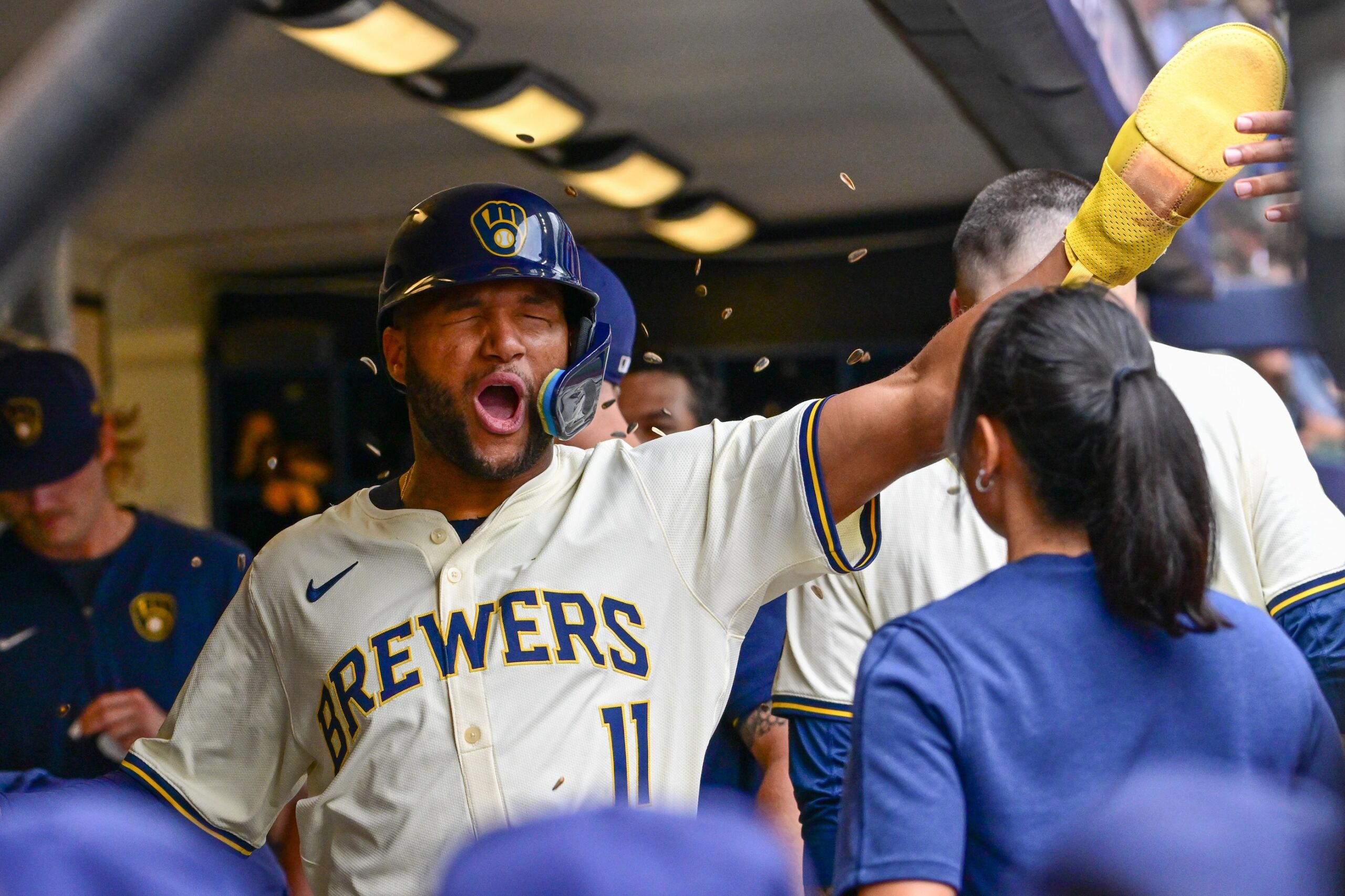 Milwaukee Brewers left fielder Jackson Chourio (11) is showered with sunflower seeds after scoring a run in the fourth inning against the San Francisco Giants.