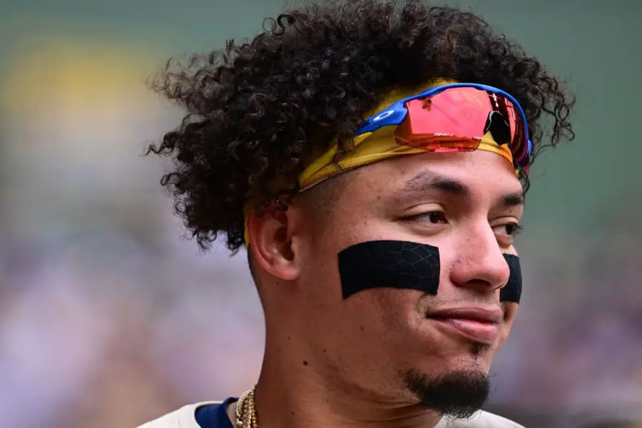 Milwaukee Brewers designated hitter William Contreras (24) looks on from the dugout in the eighth inning against the San Francisco Giants