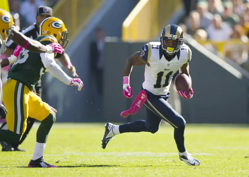 Oct 11, 2015; Green Bay, WI, USA; St. Louis Rams wide receiver Tavon Austin (11) rushes with the football during the third quarter against the Green Bay Packers at Lambeau Field. Green Bay won 24-10. Mandatory Credit: Jeff Hanisch-USA TODAY Sports