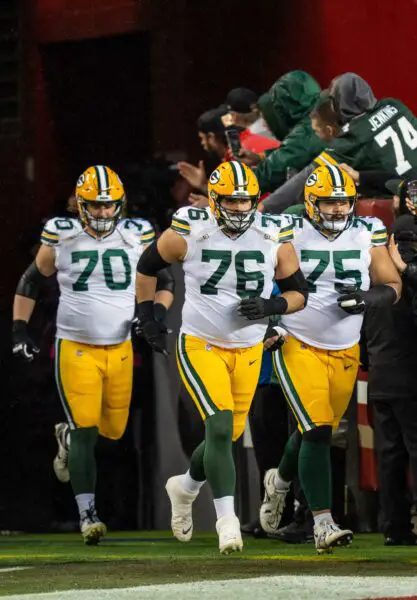 January 20, 2024; Santa Clara, CA, USA; Green Bay Packers guard Royce Newman (70), guard Jon Runyan (76), and guard Sean Rhyan (75) before a 2024 NFC divisional round game against the San Francisco 49ers at Levi's Stadium. Mandatory Credit: Kyle Terada-USA TODAY Sports