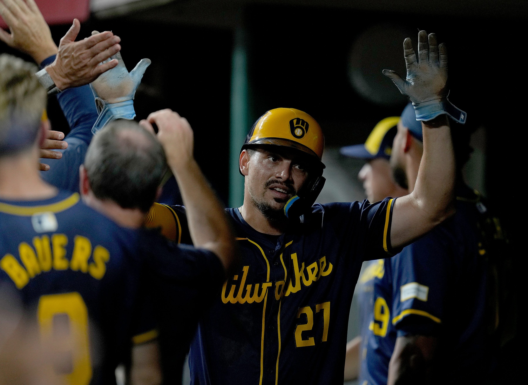 Milwaukee Brewers shortstop Willy Adames (27) celebrates a run in the 6th inning over the Cincinnati Reds at Great American Ball Park.