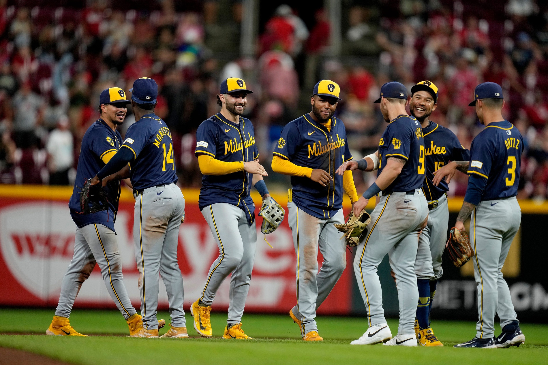 The Milwaukee Brewers celebrate beating the Cincinnati Reds 5-4 at Great American Ball Park.