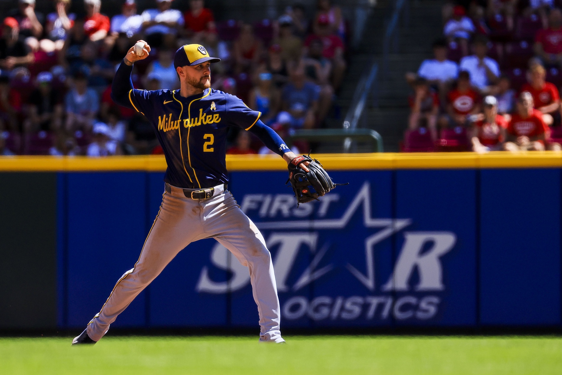 Milwaukee Brewers second baseman Brice Turang (2) throws to first to get Cincinnati Reds catcher Tyler Stephenson (not pictured) out in the ninth inning at Great American Ball Park. 