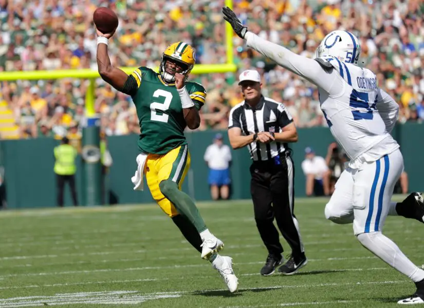 Green Bay Packers quarterback Malik Willis (2) throws a pass against Indianapolis Colts defensive end Dayo Odeyingbo (54) during their football game Sunday, September 15, 2024, at Lambeau Field in Green Bay, Wisconsin.