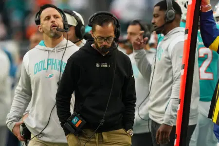 Dec 25, 2022; Miami Gardens, Florida, USA; Miami Dolphins head coach Mike McDaniel walks down the sideline during the second half against the Green Bay Packers at Hard Rock Stadium. Mandatory Credit: Jasen Vinlove-Imagn Images