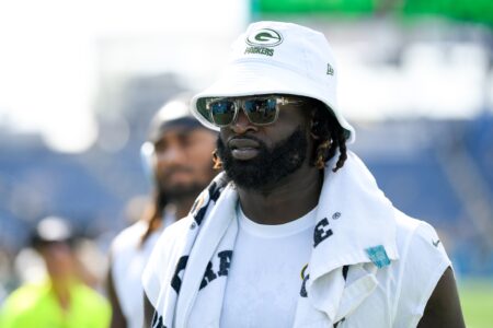 Sep 22, 2024; Nashville, Tennessee, USA; Green Bay Packers defensive end Brenton Cox Jr. (57) walks off the field against the Tennessee Titans during pregame warmups at Nissan Stadium. Mandatory Credit: Steve Roberts-Imagn Images