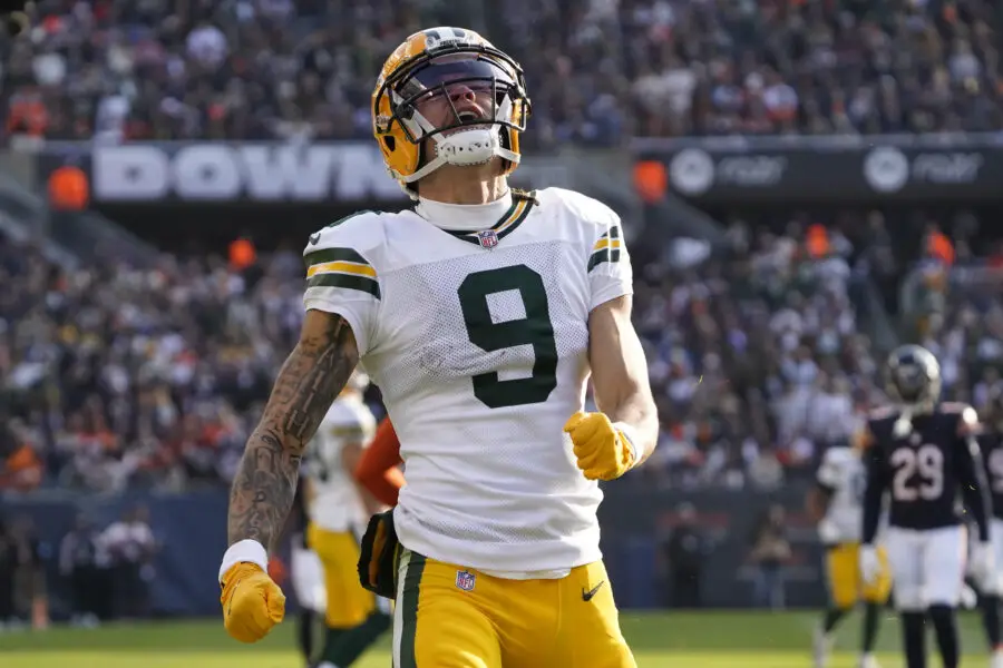 Nov 17, 2024; Chicago, Illinois, USA; Green Bay Packers wide receiver Christian Watson (9) celebrates a catch against the Chicago Bears during the second half at Soldier Field. Mandatory Credit: David Banks-Imagn Images