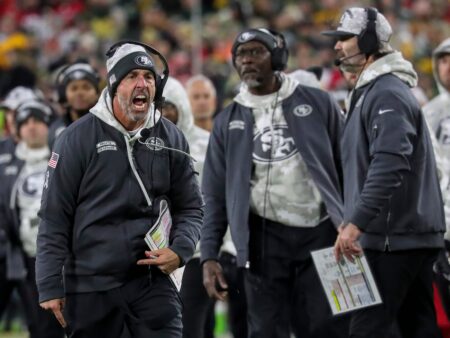 San Francisco 49ers head coach Kyle Shanahan argues with a referee after a penalty was called against the 49ers during a game against the Green Bay Packers on Sunday, November 24, 2024, at Lambeau Field in Green Bay, Wis. The Packers won the game, 38-10.