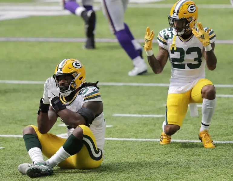 Green Bay Packers linebacker Za'Darius Smith (55) celebrates sacking Minnesota Vikings quarterback Kirk Cousins (8) with teammate cornerback Jaire Alexander (23) during their football game Sunday, September 13, 2020, at U.S. Bank Stadium in Minneapolis, Minn. Dan Powers/USA TODAY NETWORK-Wisconsin