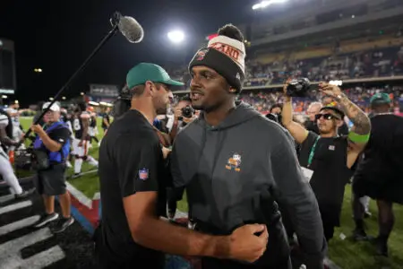 Aug 3, 2023; Canton, Ohio, USA; New York Jets quarterback Aaron Rodgers (left) and Cleveland Browns quarterback Deshaun Watson shake hands after the game at Tom Benson Hall of Fame Stadium. Mandatory Credit: Kirby Lee-Imagn Images