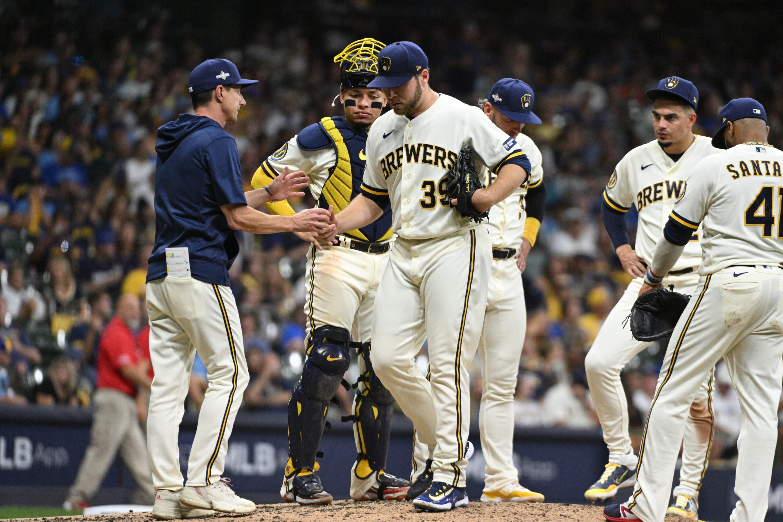 Oct 3, 2023; Milwaukee, Wisconsin, USA; Milwaukee Brewers starting pitcher Corbin Burnes (39) is relieved in the fifth inning against the Arizona Diamondbacks during game one of the Wildcard series for the 2023 MLB playoffs at American Family Field. Mandatory Credit: Michael McLoone-Imagn Images