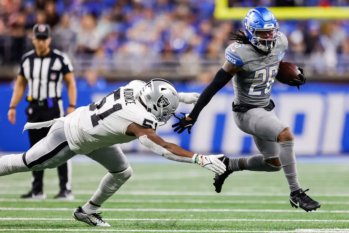 Detroit Lions running back Jahmyr Gibbs runs against Las Vegas Raiders defensive end Malcolm Koonce during the second half at Ford Field in Detroit on Monday, Oct. 30, 2023. © Junfu Han / USA TODAY NETWORK Packers