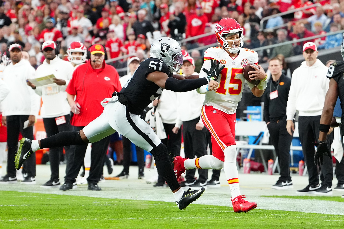 Nov 26, 2023; Paradise, Nevada, USA; Kansas City Chiefs quarterback Patrick Mahomes (15) is shoved out of bounds by Las Vegas Raiders defensive end Malcolm Koonce (51) during the second quarter at Allegiant Stadium. Mandatory Credit: Stephen R. Sylvanie-Imagn Images (Packers)