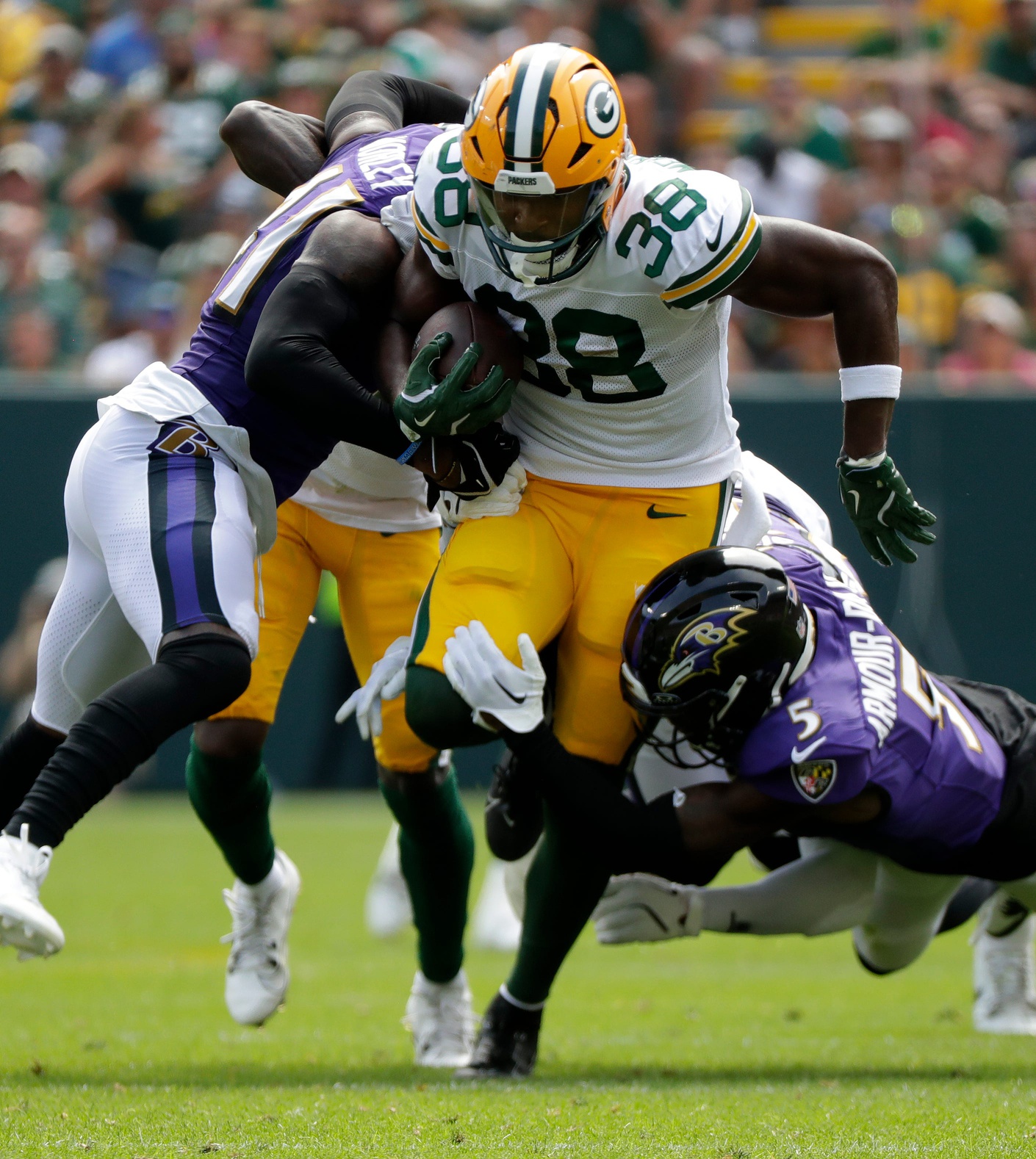 Green Bay Packers running back Ellis Merriweather (38) runs the ball during a preseason game against the Baltimore Ravens on Aug. 24, 2024, at Lambeau Field in Green Bay, Wis. © Sarah Kloepping/USA TODAY NETWORK-Wisconsin / USA TODAY NETWORK