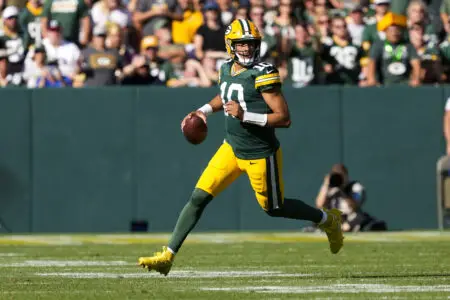 Sep 29, 2024; Green Bay, Wisconsin, USA; Green Bay Packers quarterback Jordan Love (10) looks to throw a pass during the fourth quarter against the Minnesota Vikings at Lambeau Field. Mandatory Credit: Jeff Hanisch-Imagn Images