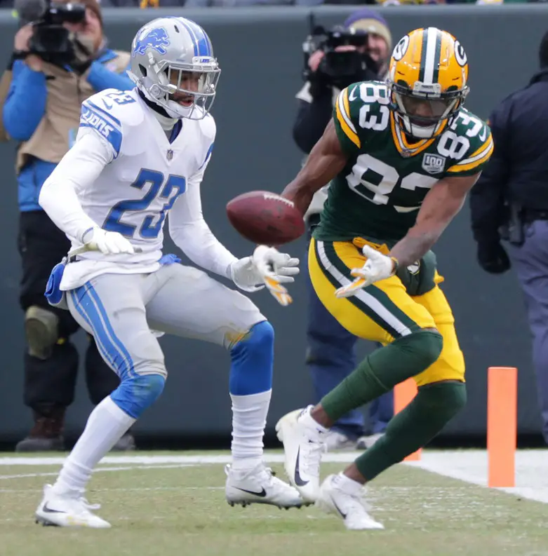 Green Bay Packers wide receiver Marquez Valdes-Scantling (83) is unable to grab a pass while being covered by Detroit Lions cornerback Darius Slay (23) during the third quarter of their game on Dec. 30, 2018, at Lambeau Field in Green Bay, Wis. The Detroit Lions beat the Green Bay Packers 31-0. © Mark Hoffman / Milwaukee Journal Sentinel / USA TODAY NETWORK via Imagn Images