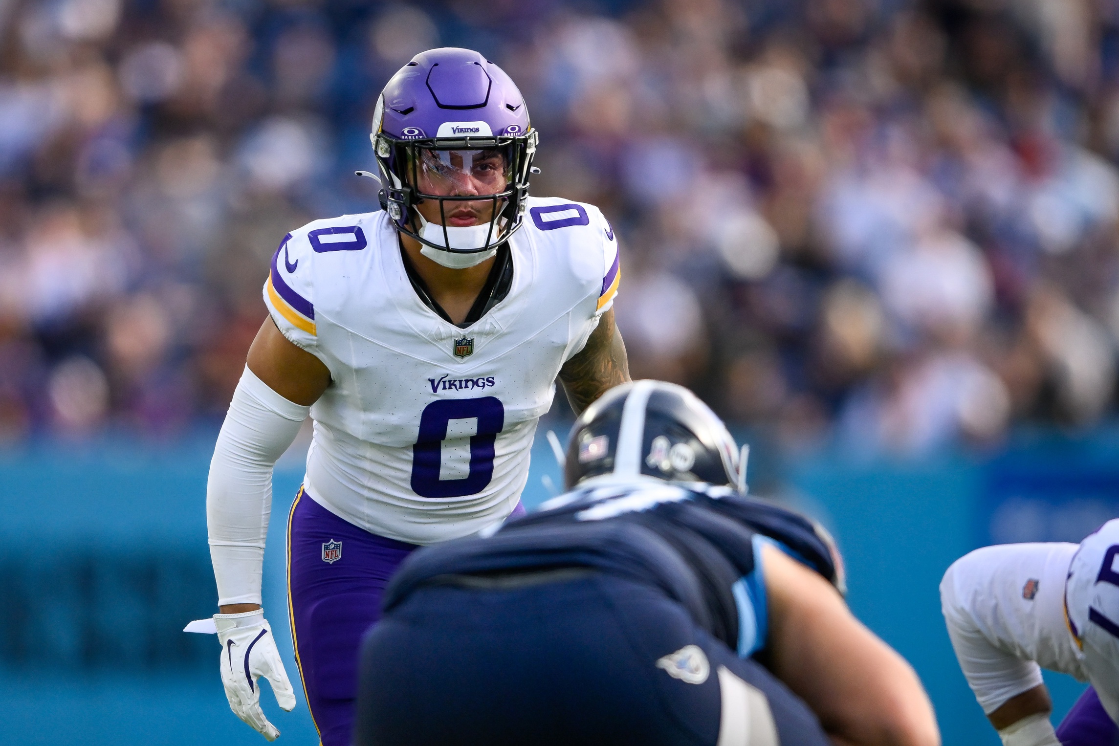 Nov 17, 2024; Nashville, Tennessee, USA; Minnesota Vikings linebacker Ivan Pace Jr. (0) sneaks a peak into the backfield against the Tennessee Titans during the second half at Nissan Stadium. Mandatory Credit: Steve Roberts-Imagn Images Packers