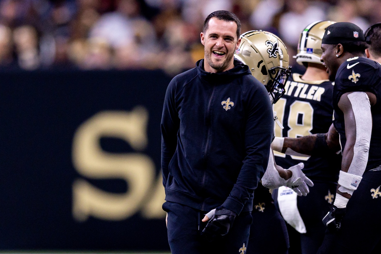 Dec 15, 2024; New Orleans, Louisiana, USA; New Orleans Saints quarterback Derek Carr (4) after a touchdown against the Washington Commanders during the second half at Caesars Superdome. Mandatory Credit: Stephen Lew-Imagn Images Packers