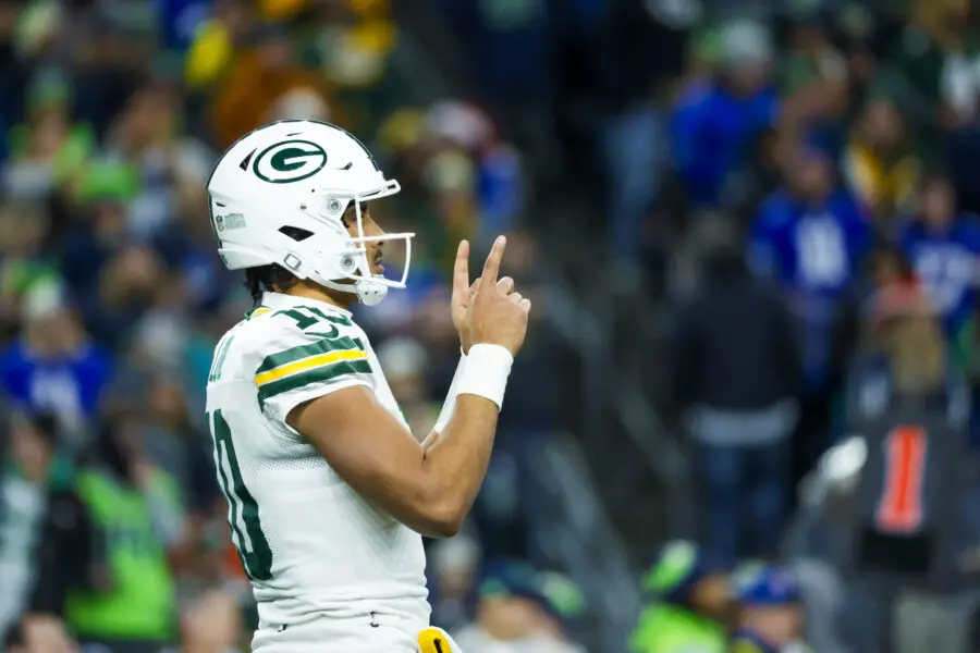 Dec 15, 2024; Seattle, Washington, USA; Green Bay Packers quarterback Jordan Love (10) reacts after completing a pass against the Seattle Seahawks during the second quarter at Lumen Field. Mandatory Credit: Joe Nicholson-Imagn Images