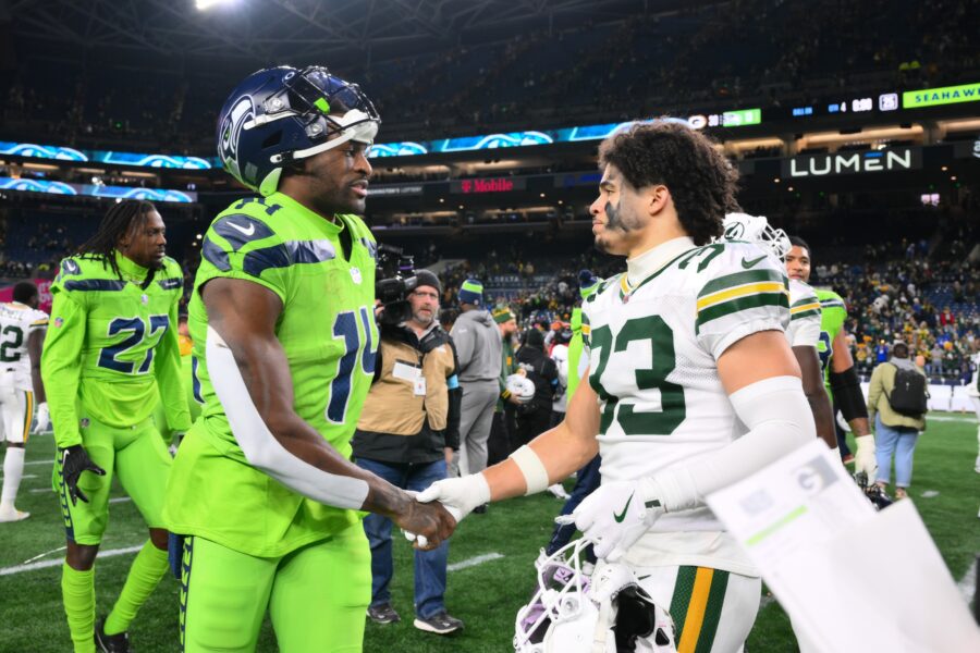 Seattle Seahawks wide receiver DK Metcalf (14) and Green Bay Packers safety Evan Williams (33)